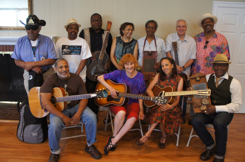 Front: (L to R) Miles Spicer, Eleanor Ellis, Valerie Turner, Benedict Turner. Rear: (L to R) Warner Williams, Jay Summerour, Rick Franklin, Jackie Merrit, Resa Gibss, Marc Pessar, Phil Wiggins.