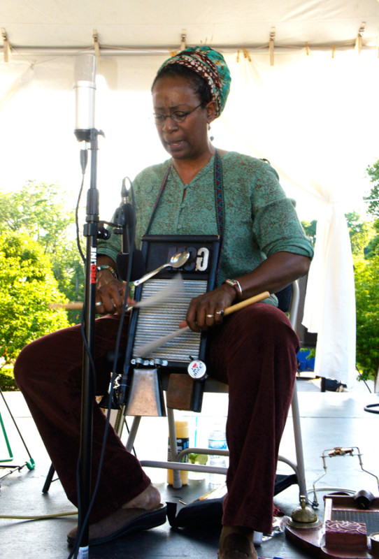 Rsae Gibbs sings like an angel…and she plays many instruments, such as washboard.