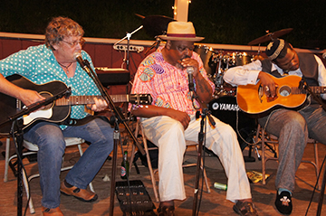 Lighting Wells performing with Phil Wiggins and Jerron Paxton, Juy 2016 at Augusta Blues Week. 