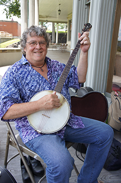 Lightning Wells plays banjo, guitar, harmonica and mandolin.