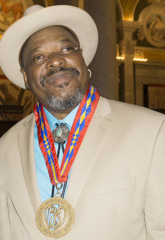 Phil Wiggins adorned with his new National Heritage Fellow medal.