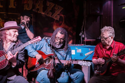 Bert Deivert (right) backing up Alvin Youngblood Hart with Brian Kramer, Mats Qwardfordt, Stockholm, Sweden. 