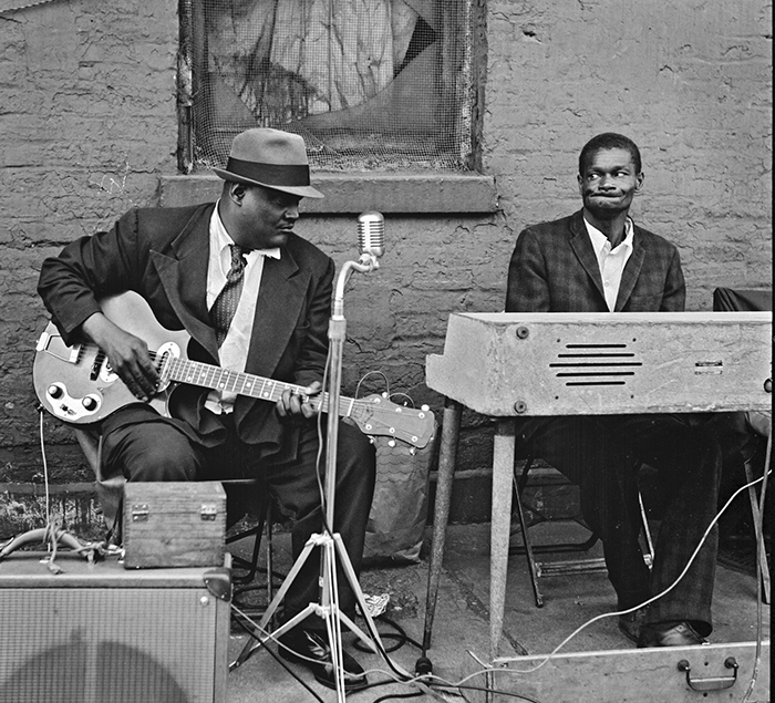 musicians playing guitar and keyboard