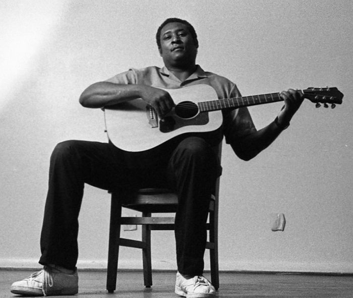 musician playing guitar