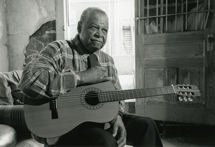 musician playing guitar