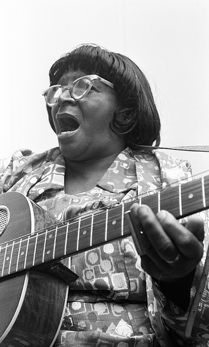 woman playing guitar