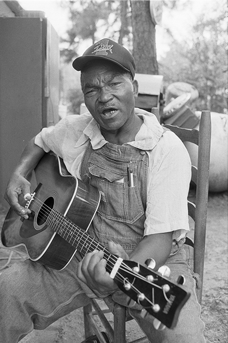 man playing guitar