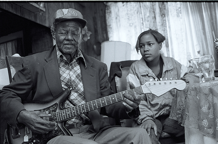 man playing guitar