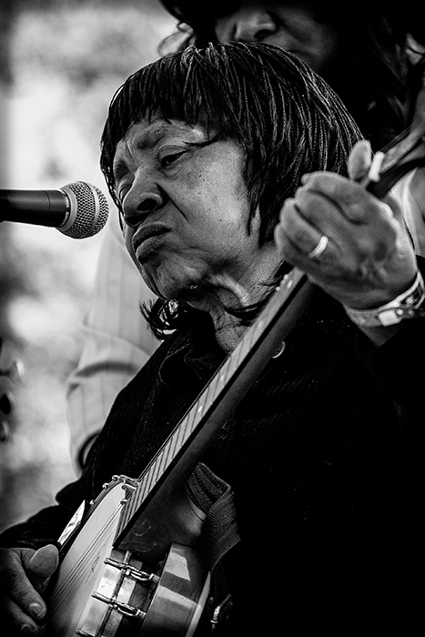 woman playing guitar