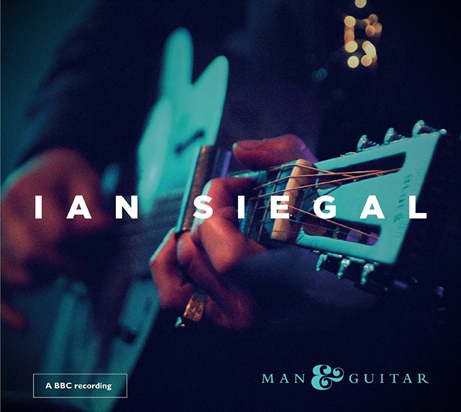 Ian Siegal hand on guitar