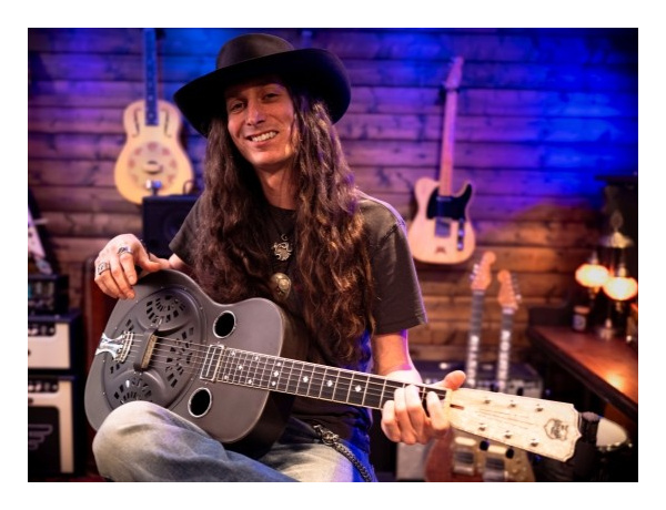 Justin Johnson with guitar