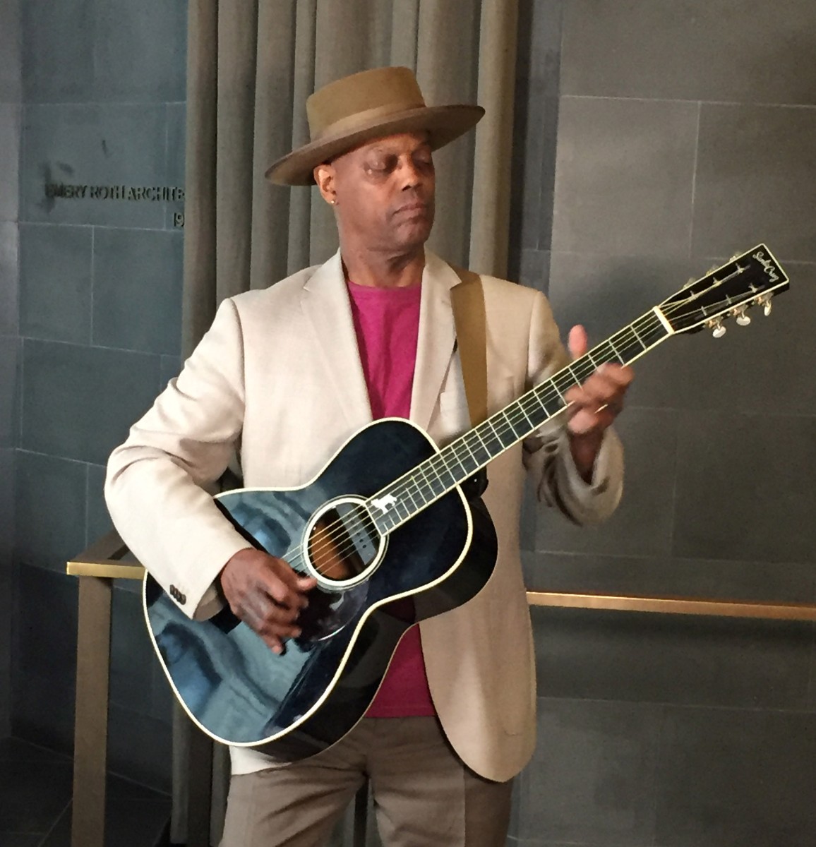 Eric Bibb playing guitar